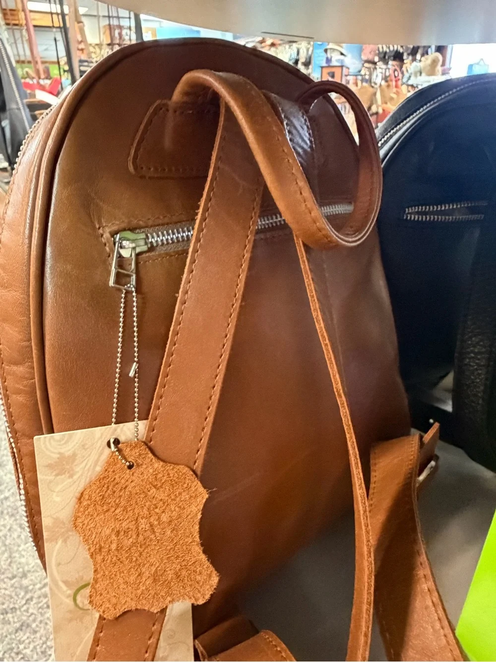 NAOT women’s Tan and Metallic Gold Leather Backpack